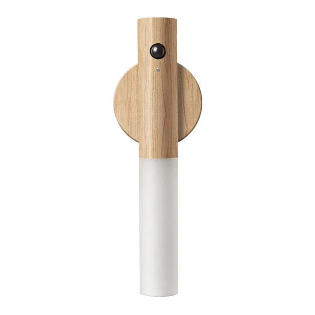 Wooden and white pepper grinder on a white background
