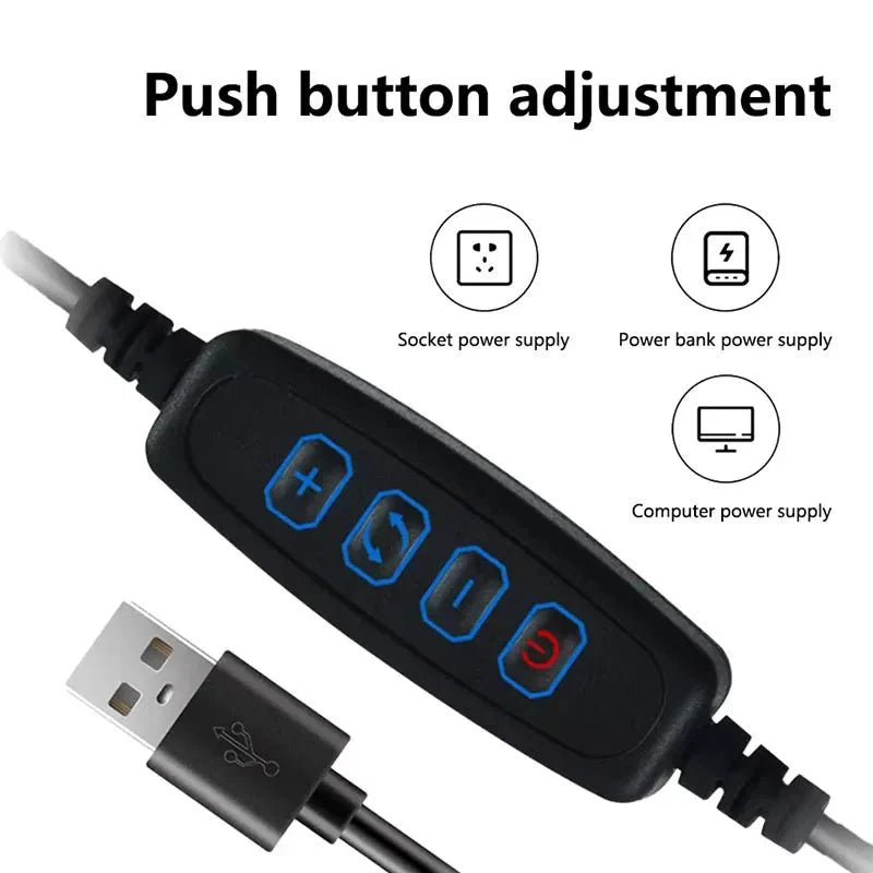 Black power adapter with USB cable and push button adjustment for various power sources on a white background.